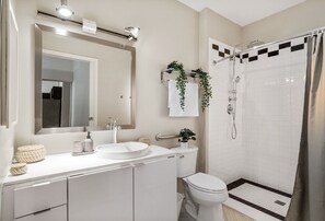 The bathroom is a private sanctuary, with a layout and features that make it the perfect place to rejuvenate.