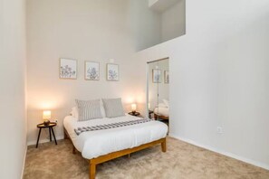 The bedroom offers a sanctuary of calm, where you can unwind and recharge in comfort and style.