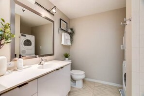 The bathroom is a private sanctuary, with a layout and features that make it the perfect place to rejuvenate.