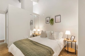 As you lie back on the queen bed, you are surrounded by elegant decor and a soothing color palette that calms the senses.