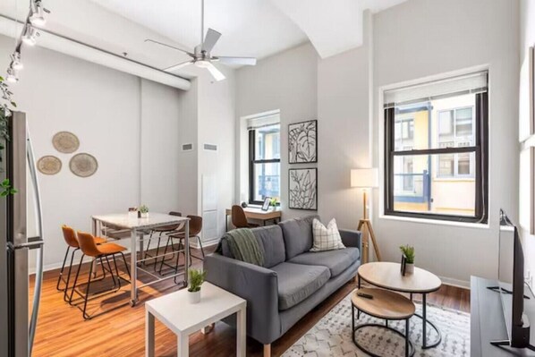 As you take a seat in the living room, the comfortable furniture and tasteful design make it easy to unwind.