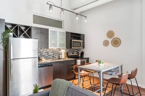 The dining room invites you to savor every moment, whether enjoying a quiet meal or hosting a festive gathering.