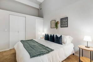 The king bedroom offers a luxurious retreat, with a bed that promises restful nights and a room that feels like a private oasis.