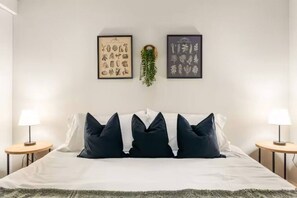As you enter the king bedroom, the sophisticated decor and plush bedding create a space where you can truly unwind.