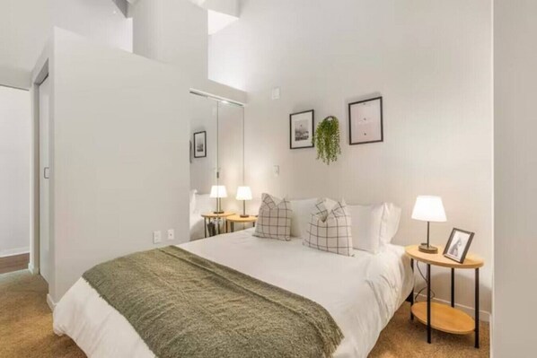 As you lie back on the queen bed, you are surrounded by elegant decor and a soothing color palette that calms the senses.