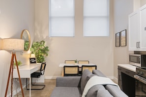 Spacious living room with stylish decor, perfect for unwinding after a day of exploring the local area.
