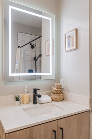 The bathroom is a private sanctuary, with a layout and features that make it the perfect place to rejuvenate.