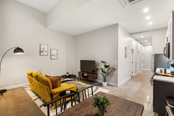 As you take a seat in the living room, the comfortable furniture and tasteful design make it easy to unwind.