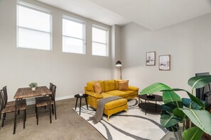 As you take a seat in the living room, the comfortable furniture and tasteful design make it easy to unwind.