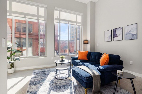 As you take a seat in the living room, the comfortable furniture and tasteful design make it easy to unwind.