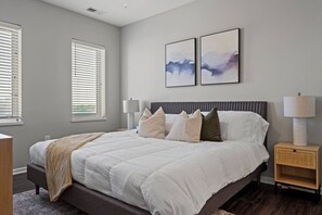 The king bedroom offers a luxurious retreat, with a bed that promises restful nights and a room that feels like a private oasis.