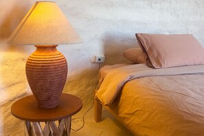 Interior View of Bed & Nightstand.
