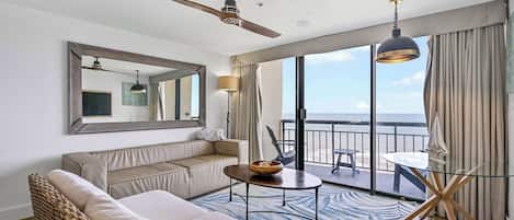Living room with queen sleeper sofa with amazing sunrise and sunsets from your 15th floor covered balconies