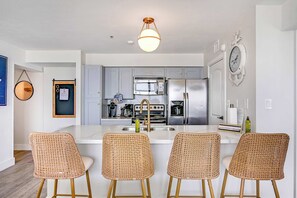 Fully stocked kitchen and dining for 4 at bar top