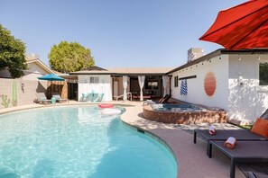 This private backyard has everything on your wish list! -Heated Pool*-Hot Tub-Large covered patio with TV-Large grassy area perfect for a yoga class-6 loungers and so much more!