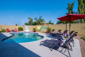 Lounge by the *heated pool in the private yard!