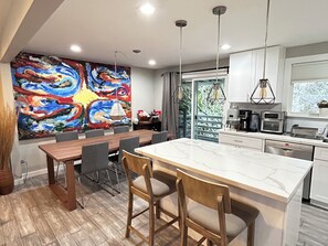 Spacious dining room that seats up to 8 people.