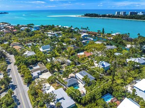 Aerial view with home outlined.  Sarasota Bay and gateway to Gulf of Mexico shown.