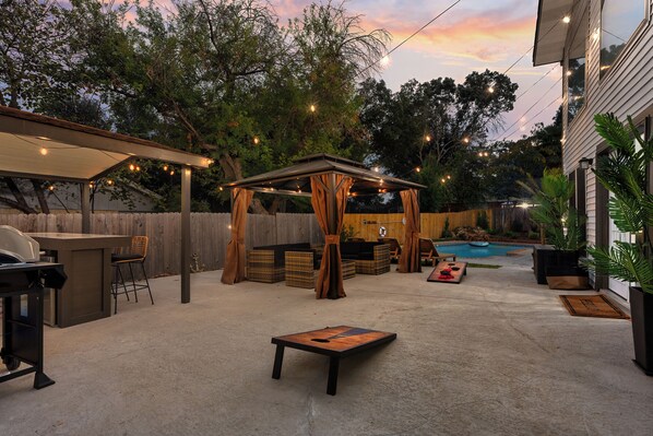 Enjoy your time outside in our Backyard Oasis! From lounging to playing games.