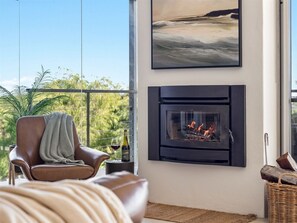 Fireplace, Seating area and Garden view