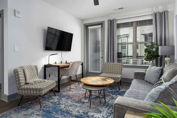 Spacious living room with 55” Smart TV with all your streaming apps