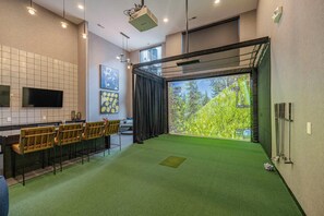 Try your hand at famous courses from around the world on the Golf Simulator!