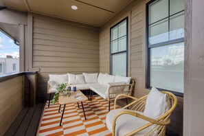 Outdoor living on the covered balcony.