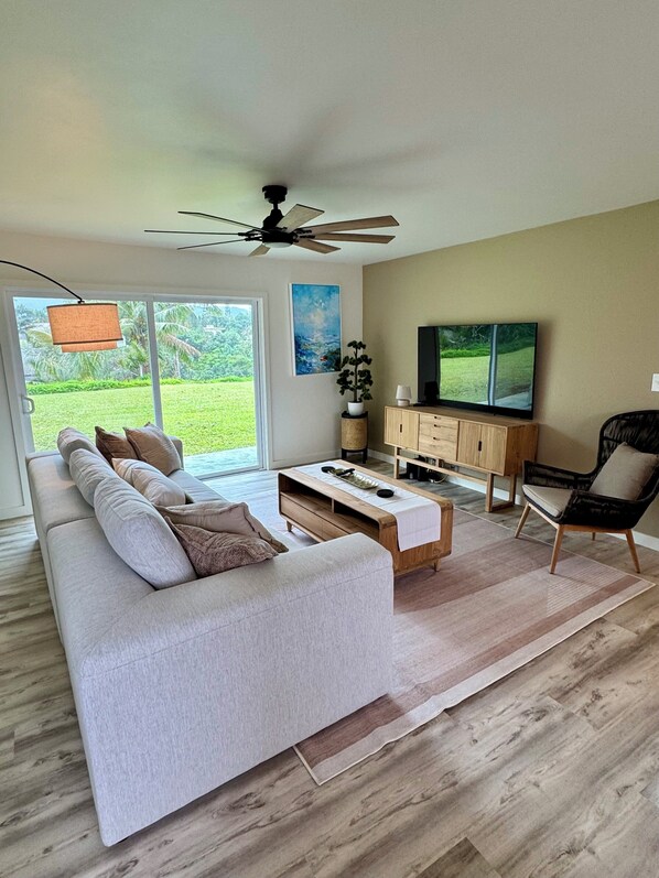 Warm and inviting living space that opens to the backyard with mountain views.