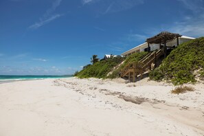 Double Bay Beach, two miles long.  Veselka is the house with the peaked roof above the bend in the beach.