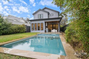 A splash of serenity - Poolside fun meets modern living.