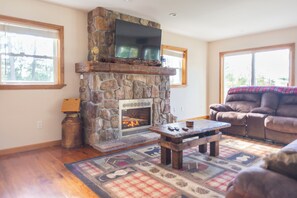 Gas fireplace and smart TV in the living room. Relax and re-connect!