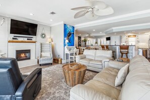 Large flat screen with plenty of seating