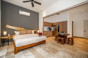 Rest easy in this inviting bedroom featuring a plush queen-sized bed and soft linens.