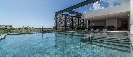 Dive into relaxation with our refreshing pool, perfect for a sunny day