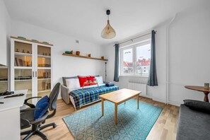 Studio - Living area with Queen Bed and Smart TV | Book Now with RENTUJEMY.COM