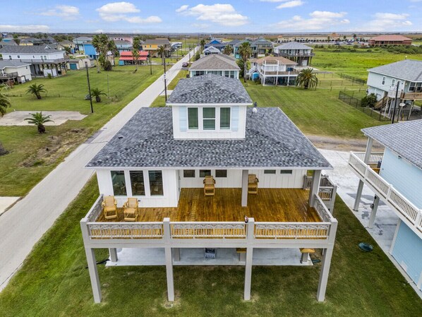 Spacious upper deck with seating, perfect for enjoying stunning neighborhood views.