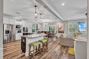 This 3,800 sq ft beauty hosts up to 18 guests and welcomes your pet too!