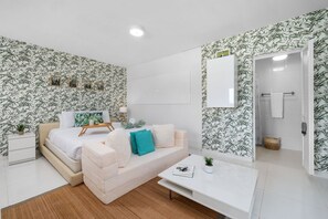 Small space, no problem! This all-in-one unit is stylish and modern, featuring a spacious bed and a sofa bed.