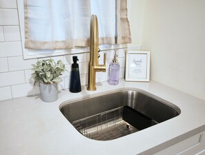 Upgrade your cooking with sleek, modern touches for style and easy cleanup.