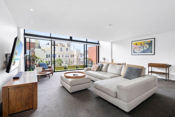 Large oversized living area, with stunning private terrace.