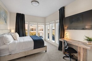 King Bedroom luxuriously designed. 55"TV. Extremely comfortable with an attached bathroom and walk in closet.