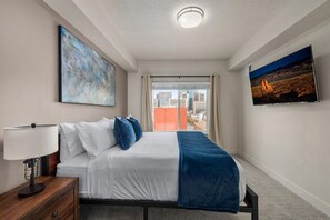 King Bedroom luxuriously designed. 55"TV. Extremely comfortable with an attached bathroom and walk in closet.