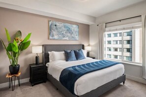 King Bedroom luxuriously designed. 55"TV. Extremely comfortable with an attached bathroom and walk in closet.