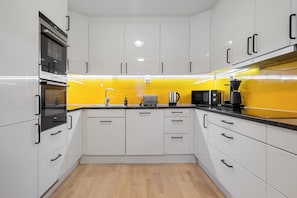 Modern kitchen with equipment to cook. 