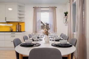 The dining table seats up to 10 guests. 