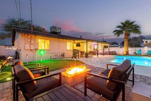 3 Hole putting green and cozy firepit lounge. 