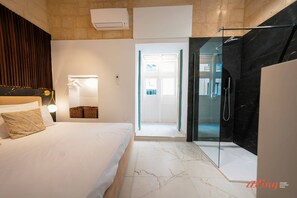 The main bedroom with a private shower
