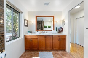 Step into comfort with a spacious and modern bathroom.
