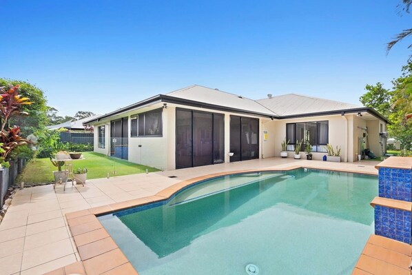 Make a splash in the gorgeous swimming pool with a shallow area perfect for families.
