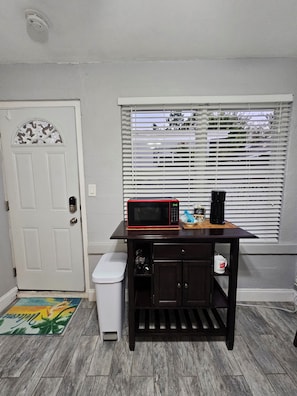 Microwave, Pod Coffee Maker, Coffee Mugs, Silverware, Wine Opener, etc. 